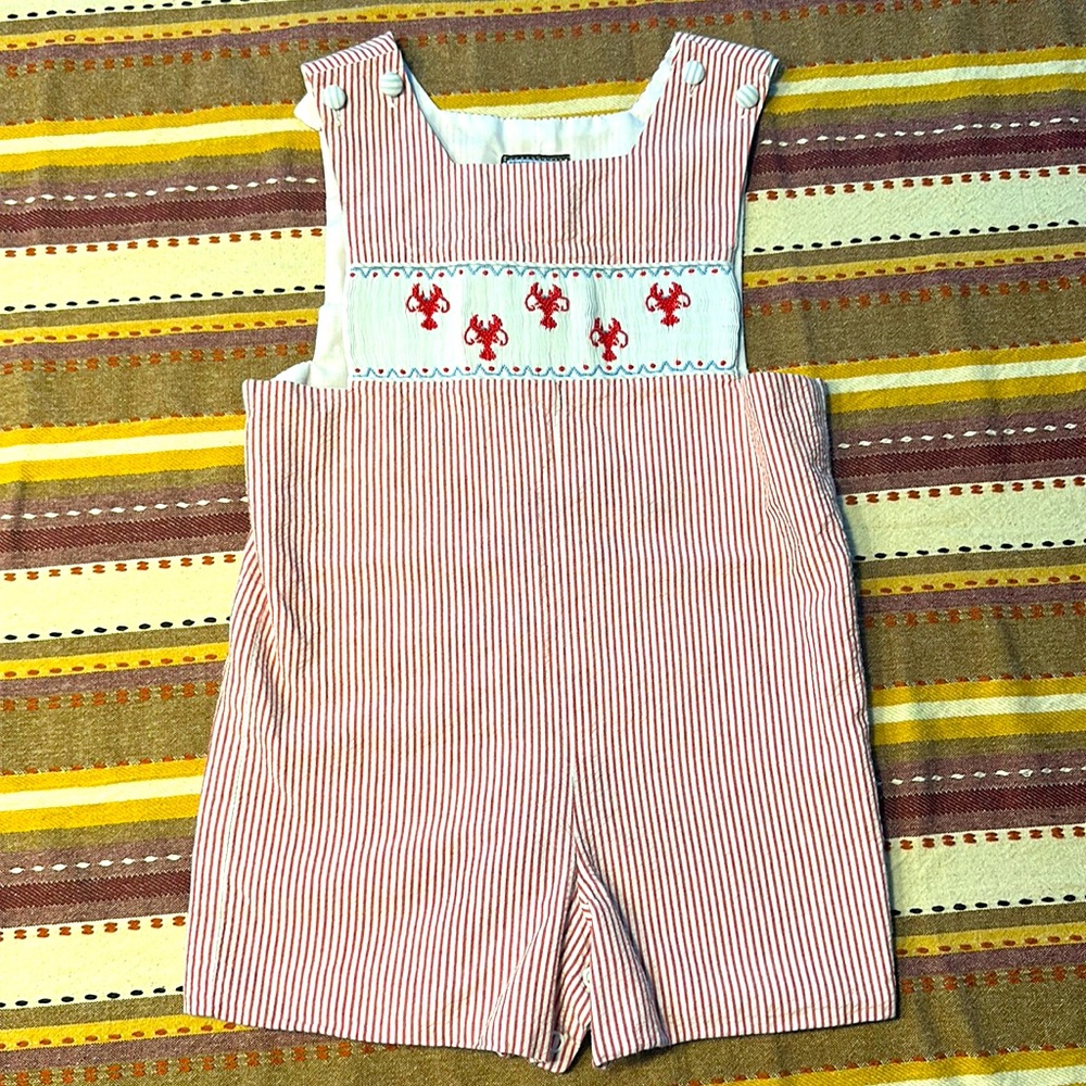 Red seersucker lobster smocked shortall.